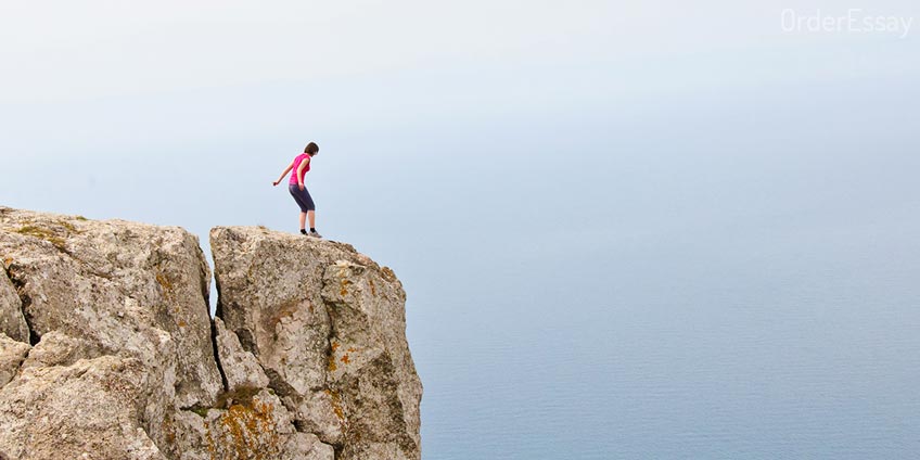 Man Making Step from Cliff